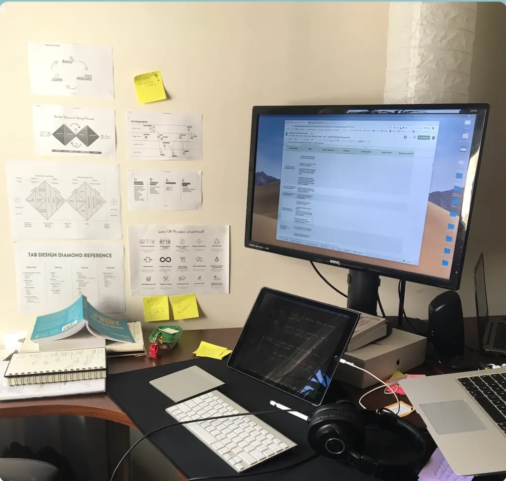 My desk at Sotrender, with design process references on the wall